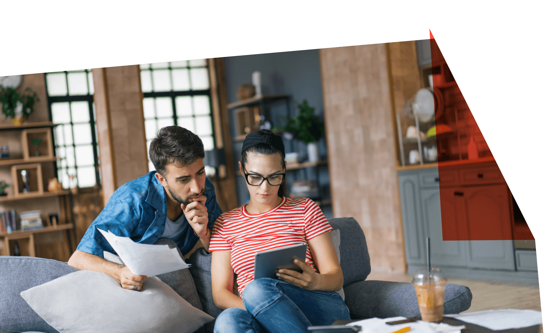 couple looking at forms together with tablet