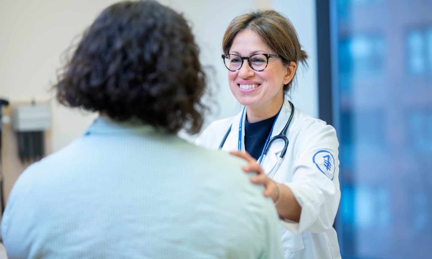 two women medical office interaction